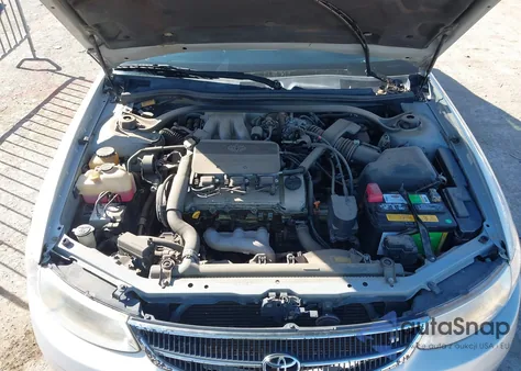 2000 Toyota Camry Solara Sle V6 z USA, uszkodzony, nr VIN 2T1CF22P8YC313414